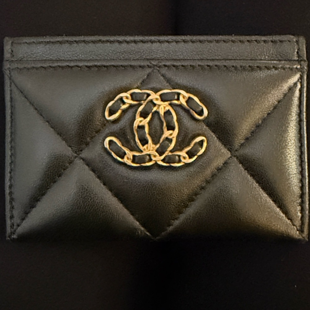 CHANEL Quilted Black Card Holder with Gold Logo